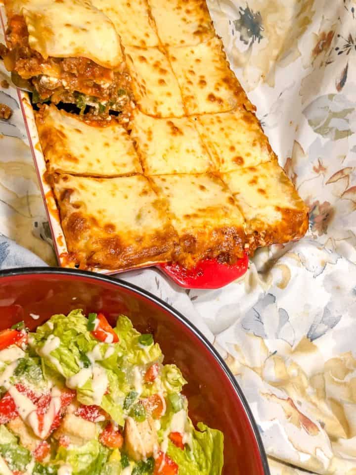 Aqueena's homemade lasagna served with salad