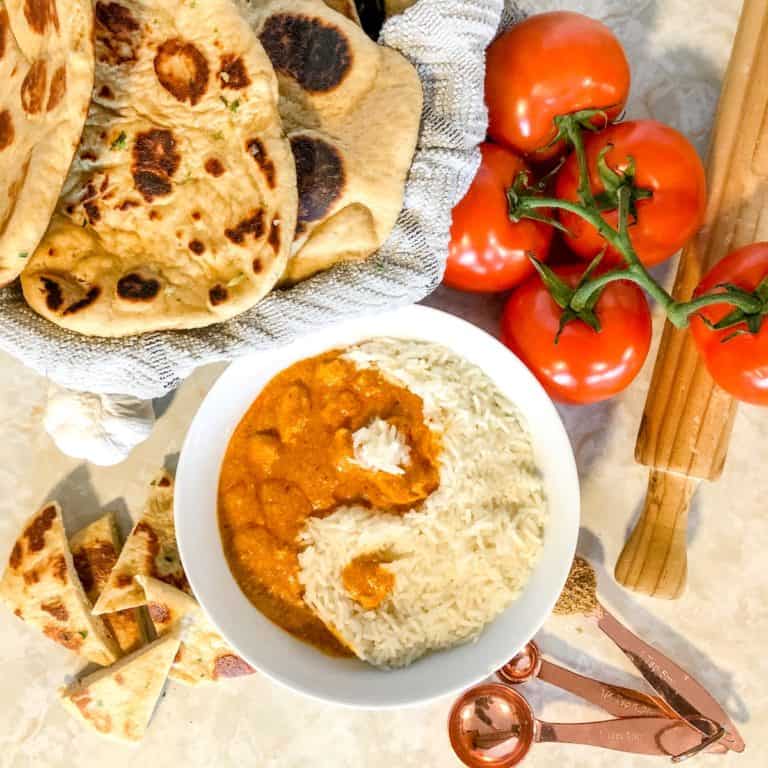 Easy butter chicken served with naan and rice