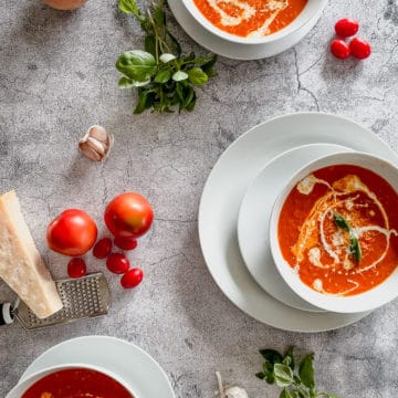 three bowls of tomato soup