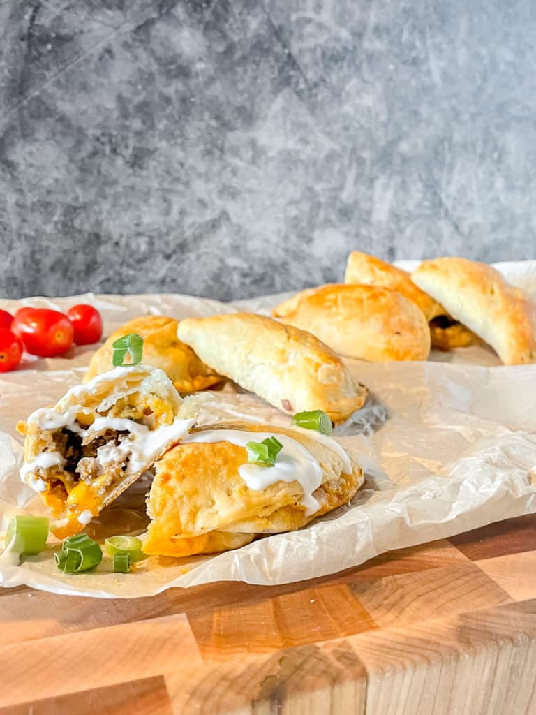 Golden baked taco pockets that can be filled with shredded chicken