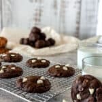 Peppermint Chocolate Chip Cookies with cookie dough in the background