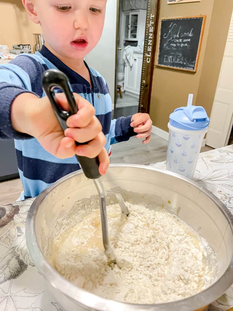 mixing flour into pancake batter