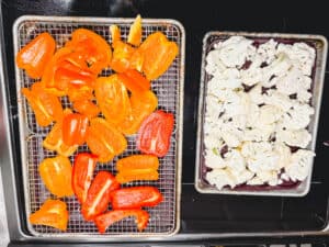 Bell Peppers and Cauliflower on a baking sheet