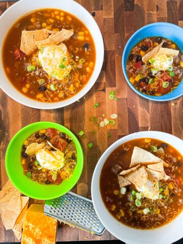 Taco soup flat lay with four bowls