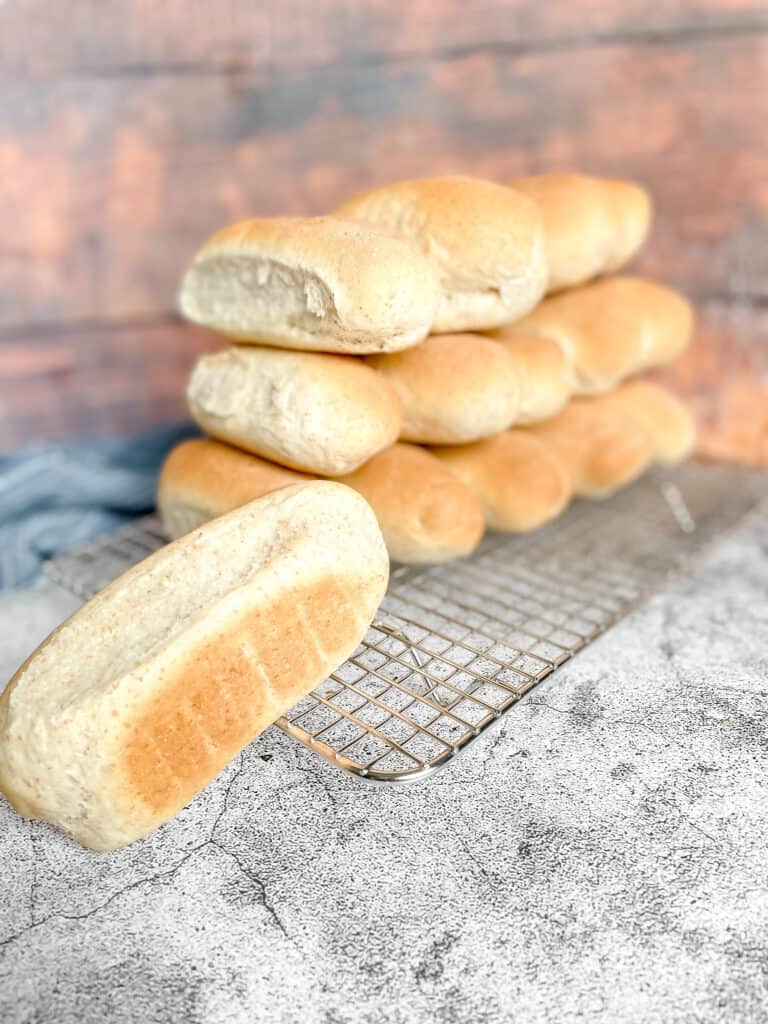 hotdog buns on a baking rack